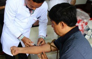 Blood sample withdrawal for laboratory testing, Kampong Thom PRH blood bank, March 2018